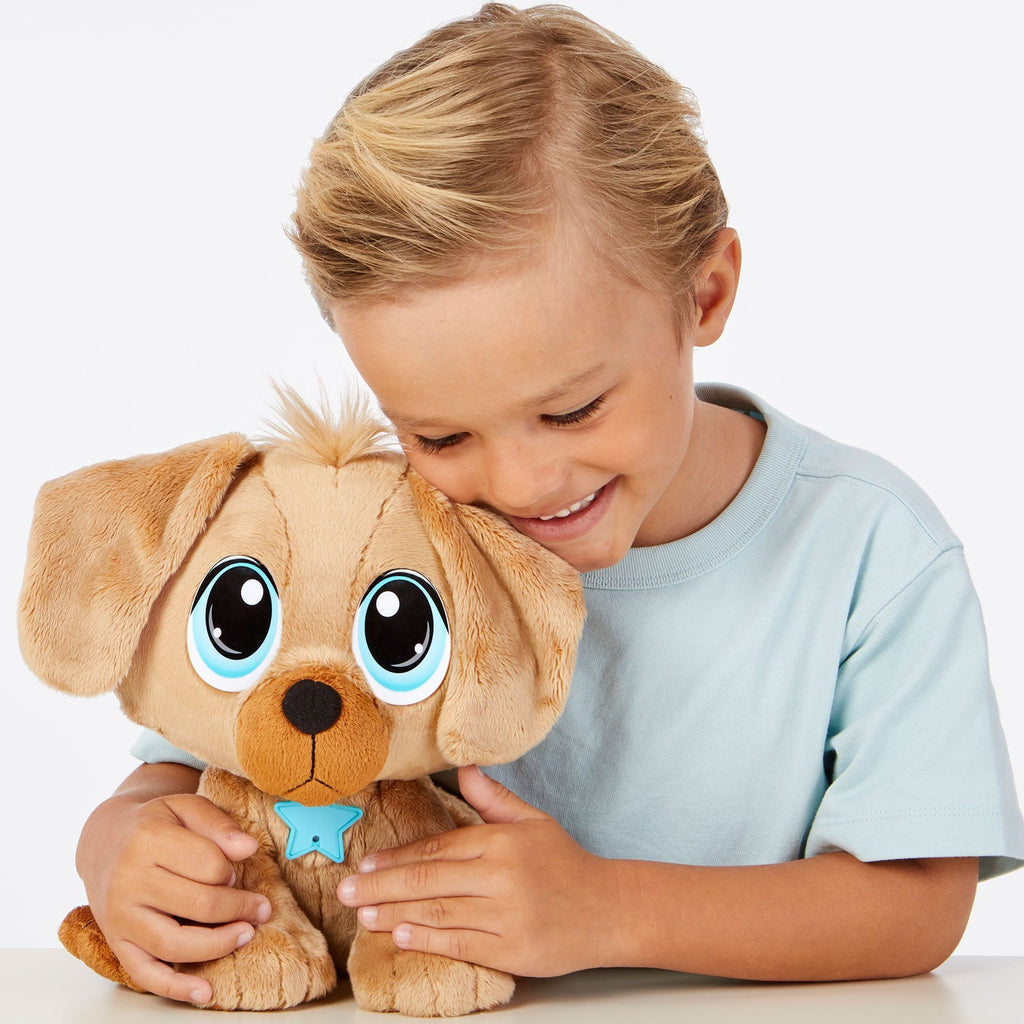 boy holding the toy dog